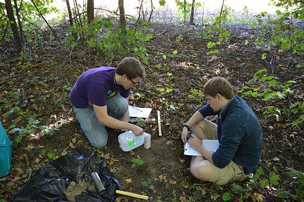 Mount Union students participating in an outdoor experiment  